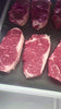 Prime raw kc strip Ribeye steaks straight from a small farm in queen city, Missouri